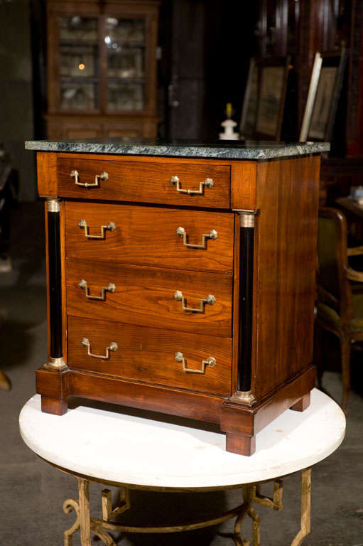 Miniature form mahogany French Empire chest with marble top.