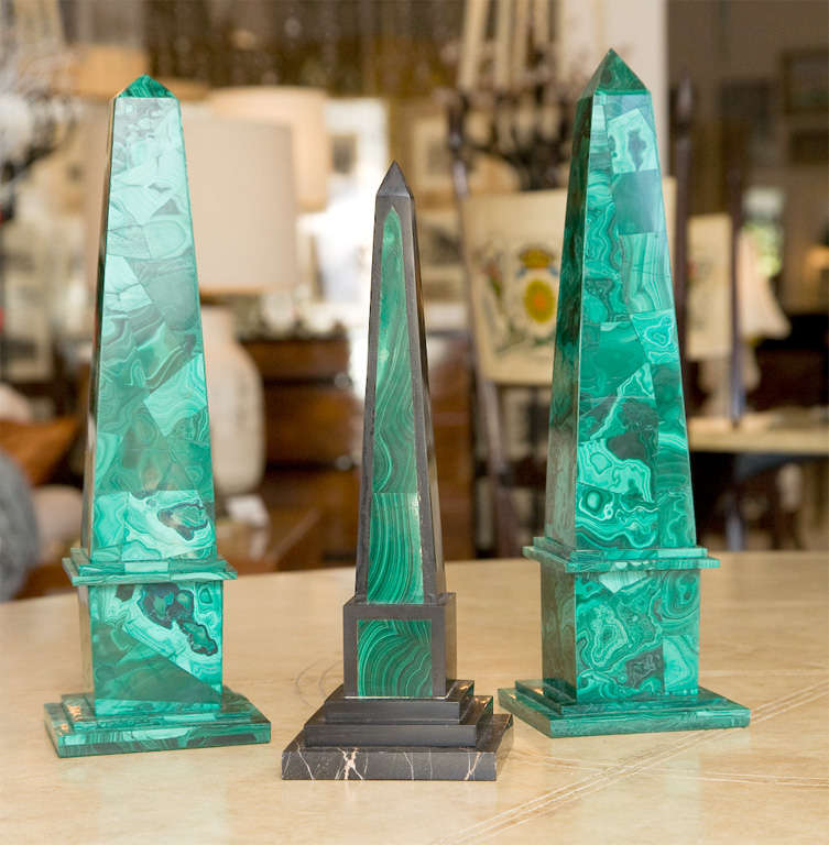 These beautiful Malachite Obelisk are hand carved showcasing beautiful natural details.  These are of the highest quality malachite with very little filler used.  The two are sold as a pair.  The pair measures 12.5