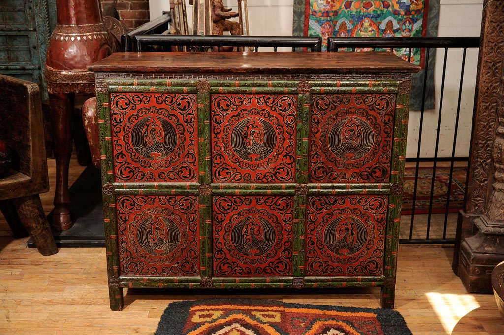 Tibetan Monastery Chest , Embossed painting, depicting the  Phoenix For Sale