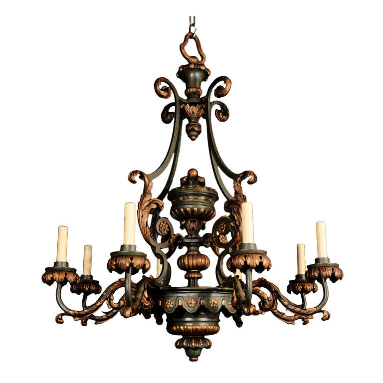 Gilt and Polychromed Iron Eight Light Chandelier. For Sale