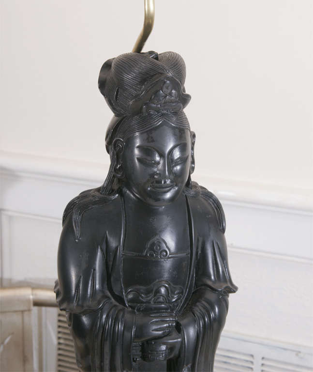This unique in size pair of oriental figurine lamps have been beautifully carved out of polished stone. Each figure has wonderful detailing and they have been newly rewired with silk rayon cords.