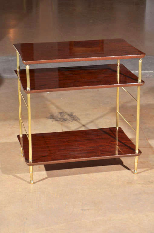 Attractive 3 tier french polish mahogany and brass side end table.