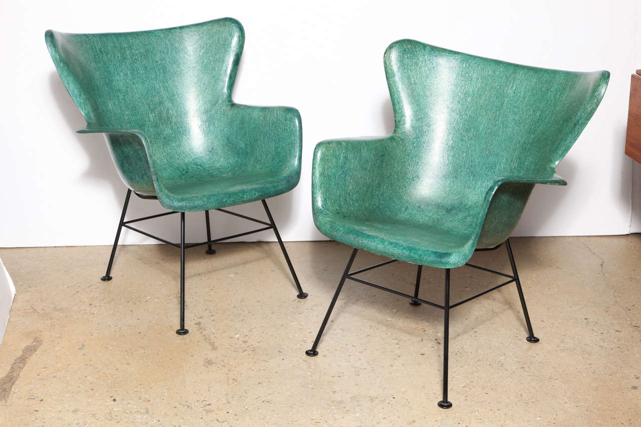 2 super comfortable Lawrence Peabody designed Wingback Chairs in Green Fiberglass with Green threading with Black Cast Iron back support and Cast Iron Legs.  Chair shell can be removed from base