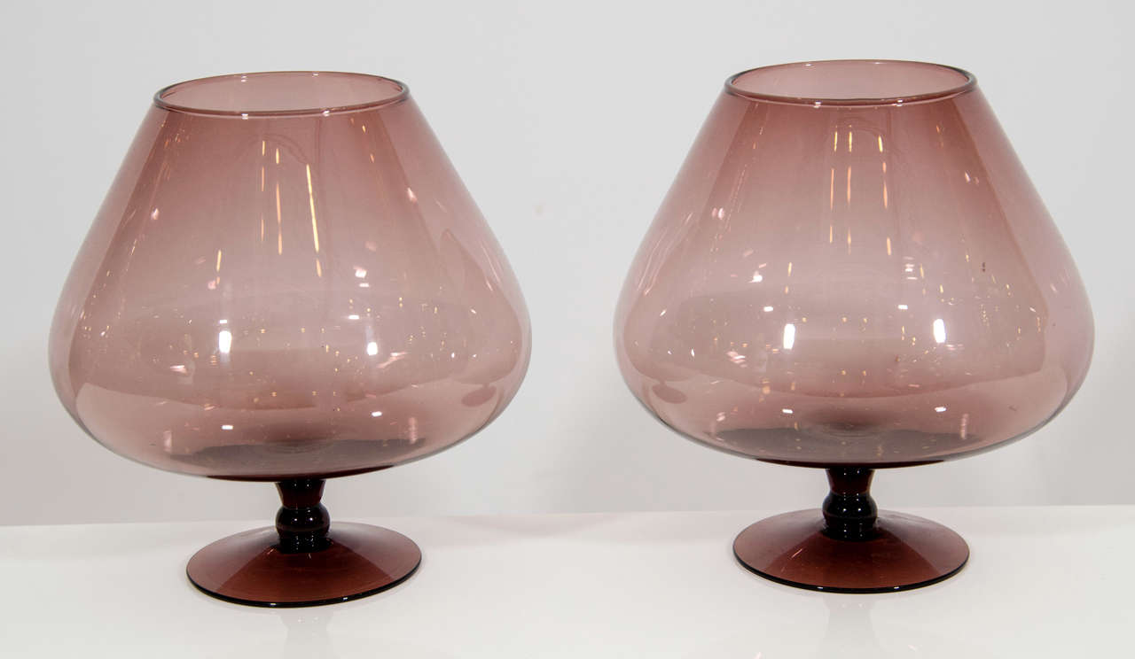 Lovely pair of decorative snifters in an amethyst color art glass. Please contact for location. \