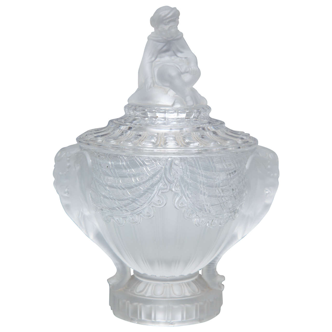 A Fine pair of orientalist French signed Baccarat candy covered compotes with elephant handles and an oriental figure at the apex. Crystal carved drapery spills down luxuriously from the lid of the compote while elephant's tusks help support the