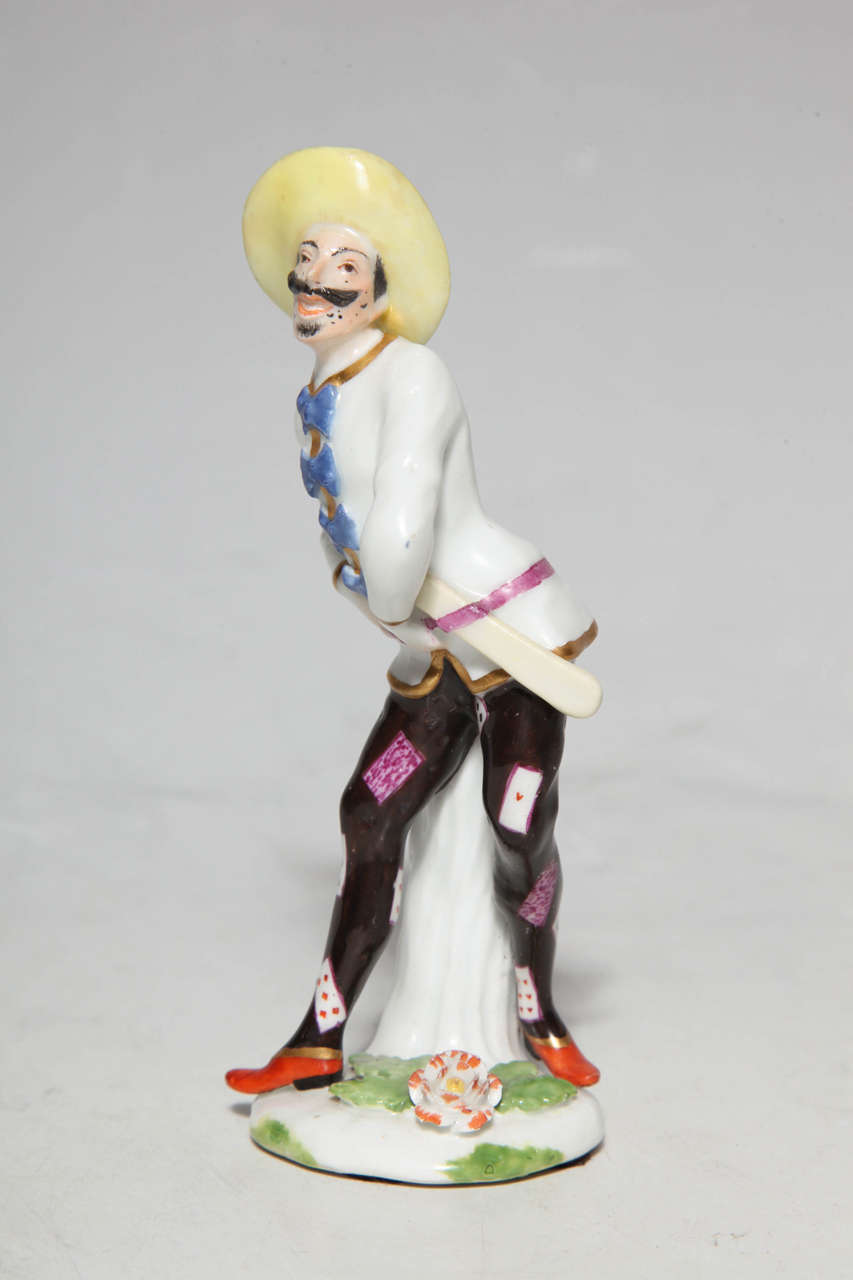 A 18th century Meissen Commedia Dell'arte porcelain figurine by J. J. Kandler. This exquisitely painted porcelain figurine is a member of the Italian comedy troupe or the Commedia Dell'arte, which originated in Italy in the 16th century. This figure