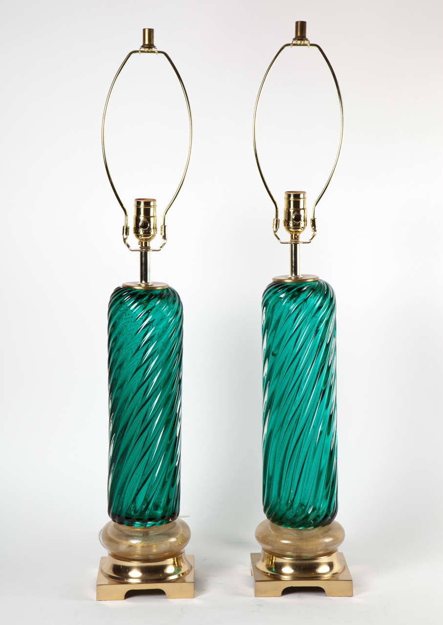 Pair of lamps in emerald and gilt Murano glass.
