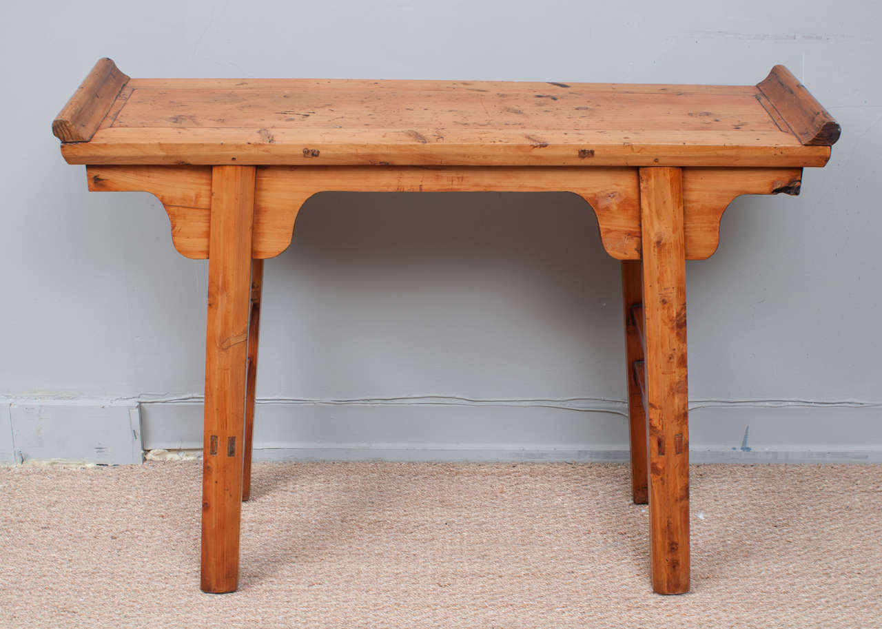 Small ming style scroll top altar table crafted from mellow peach wood with traditional mortice and tenon construction.