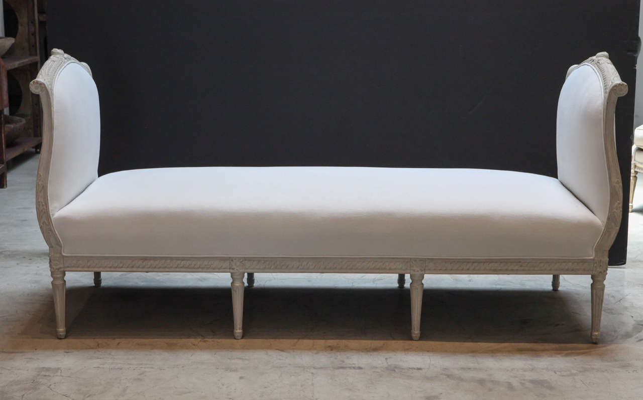 a stoically beautiful swedish daybed , newly upholstered in swedish linen.