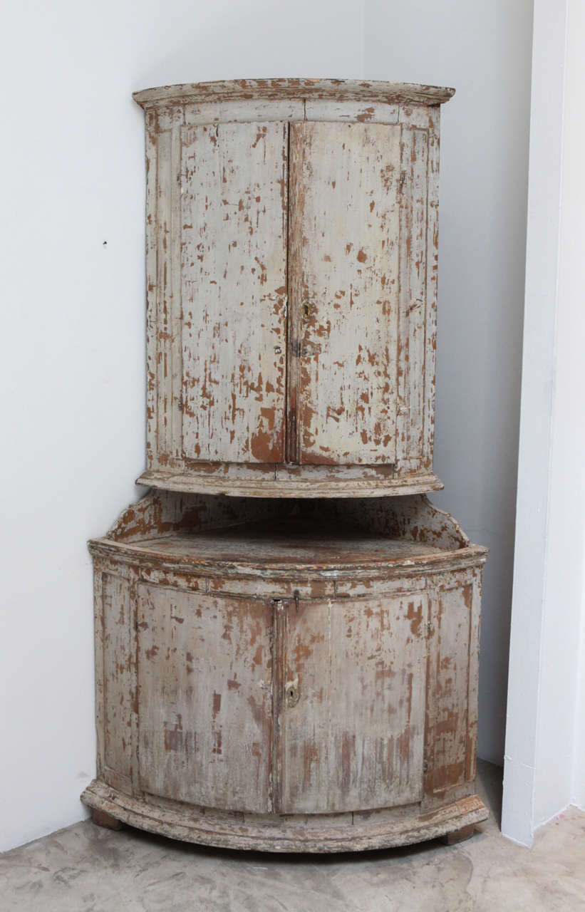 a handsome swedish corner cabinet in it's beautiful scraped finish.