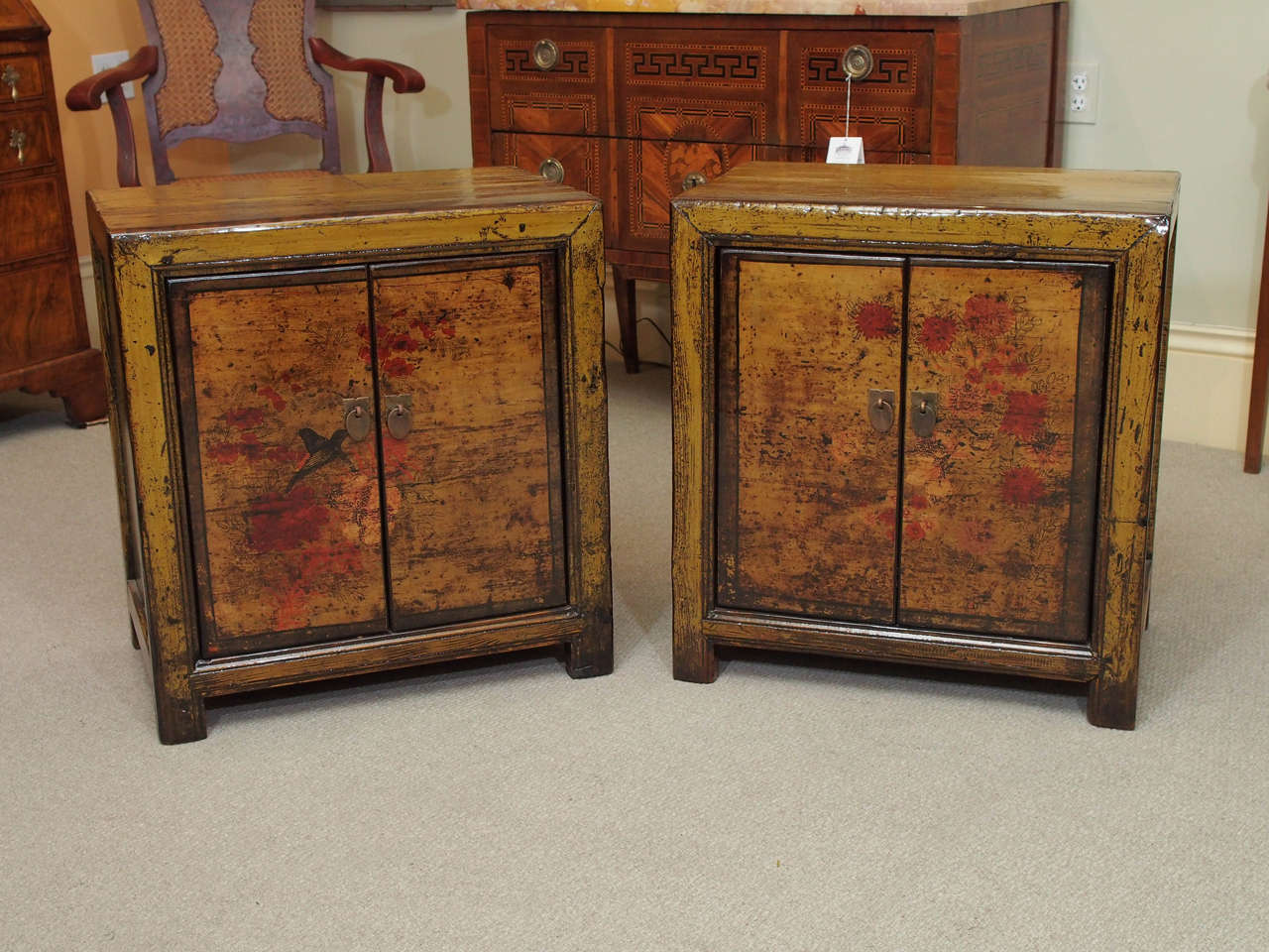 Pair antique Chinese olive green lacquer, multicolored bedside cabinets.