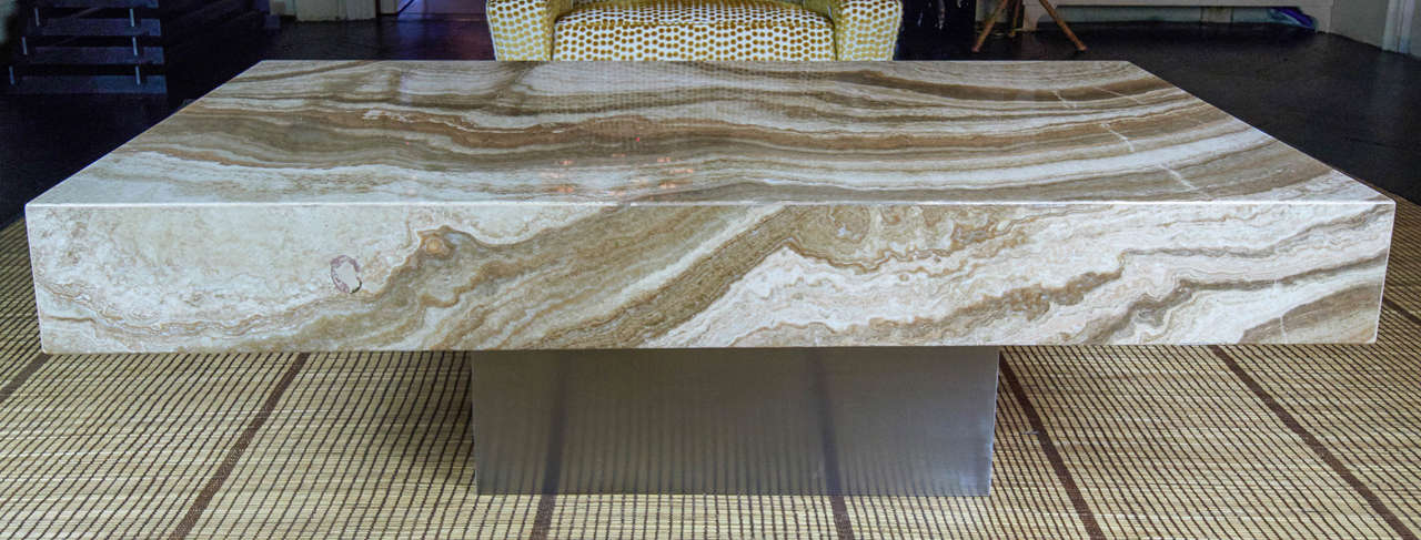 Onyx slab with a beautiful vintage patina, brushed steel base.