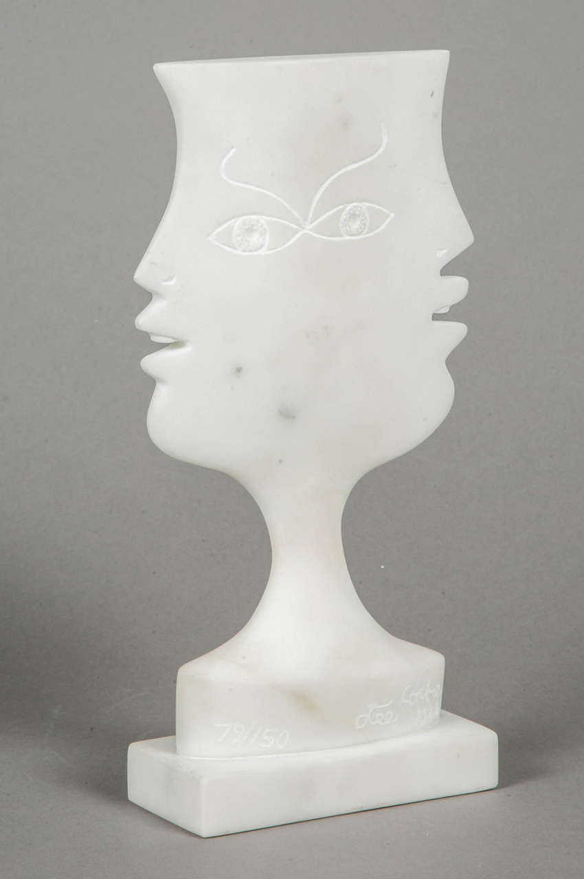 Les Cyclades, 1926, by Jean COCTEAU
Refined marble sculpture figuring a bust with two profiles.
Marble edition from circa 1980.
Signed, dated and numbered 79/150. 
Base: H.2.2 x w.5 x d.11,2 cm.
Head : H.22.3 x 13.5 x 3.5 cm.

Jean Cocteau
