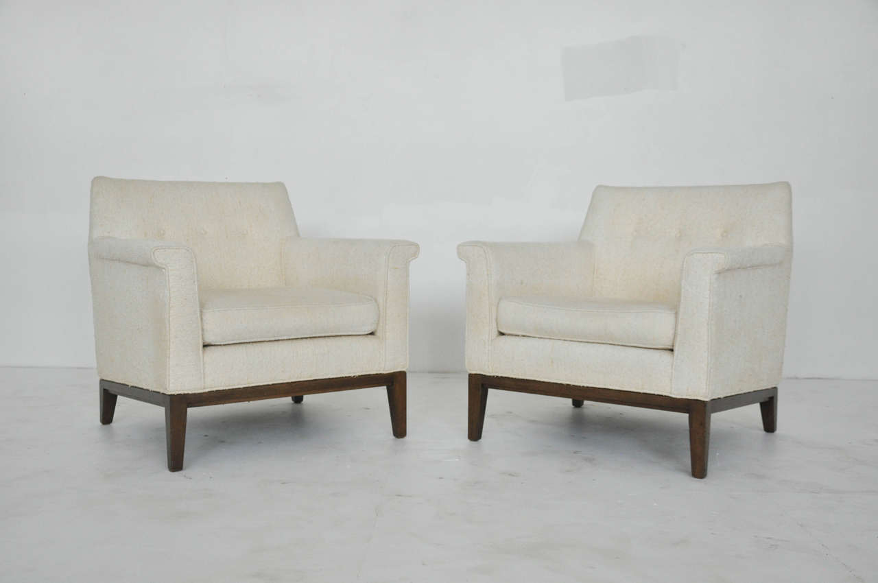 Pair of lounge chairs by Edward Wormley for Dunbar. Vintage upholstery over mahogany frame.