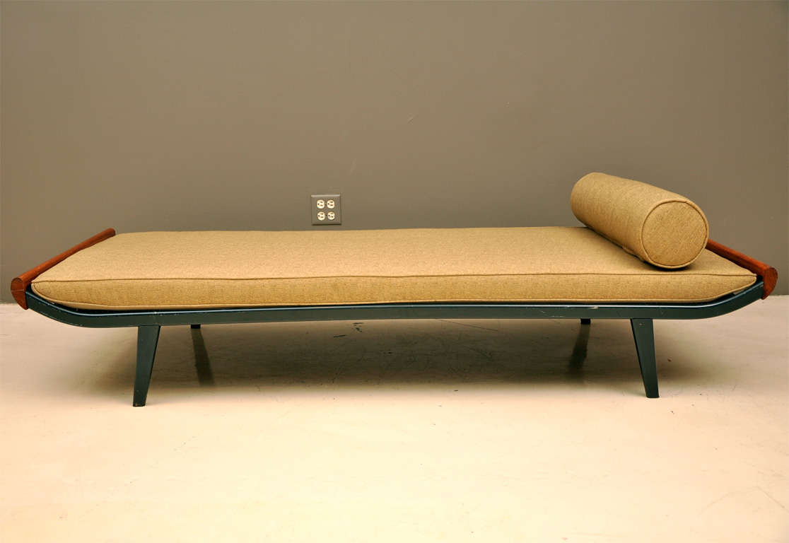 Teak and aluminum daybed upholstered in new fabric.