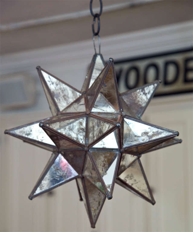 A very fine mirrored glass moravian star pendant ceiling light. Mirrors are semi-translucent and can be lit from within.
