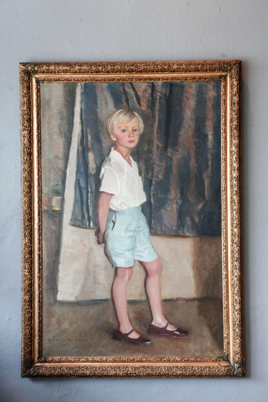 a portrait of a little tomboy in it's original water gilt frame.