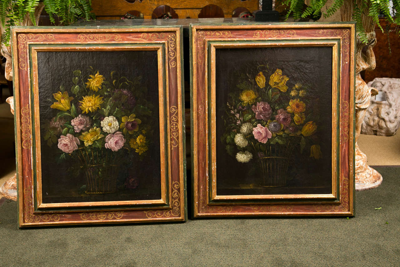 A pair of Italian school, early 19th century, floral still lifes in Florentine frames.