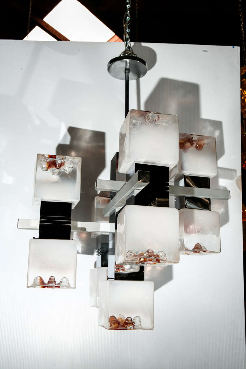 Pair of Stylized Mazzega Cubed Glass Chandeliers. Each light fixture has 9 cubes.