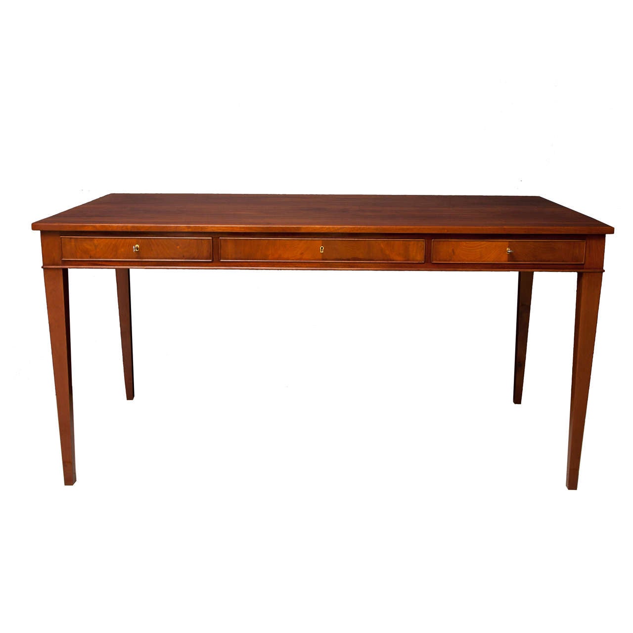 A Danish mahogany bureau-plat by Frits Henningsen, Furniture designer and Cabinet Maker (1889-1965). This desk is a classic example of Henningsen's elegant clean lines and use of quality woods with perfect balanced craftsmanship.

A rectangular