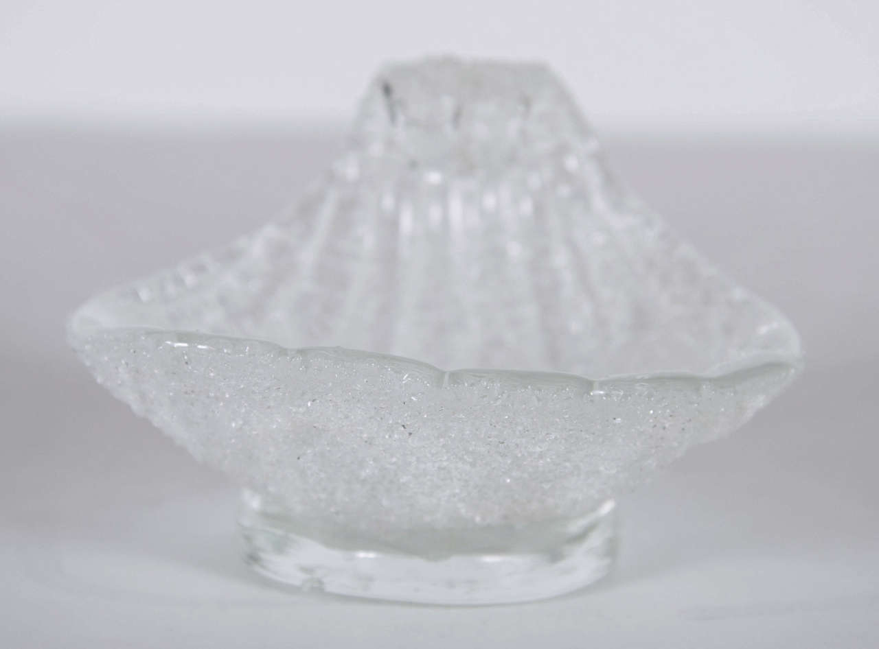 This gorgeous shell design form bowl features a textured and relief form glass with a ribbed design. This would be great in a powder room for fancy soaps or for just display.