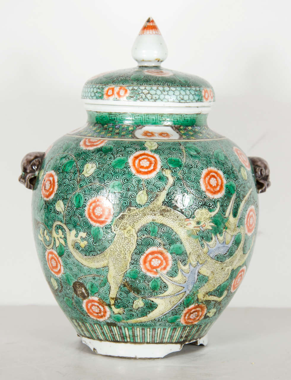 Exquisite Pair of Chinese Porcelain Covered Urns with Foo Dog Handles