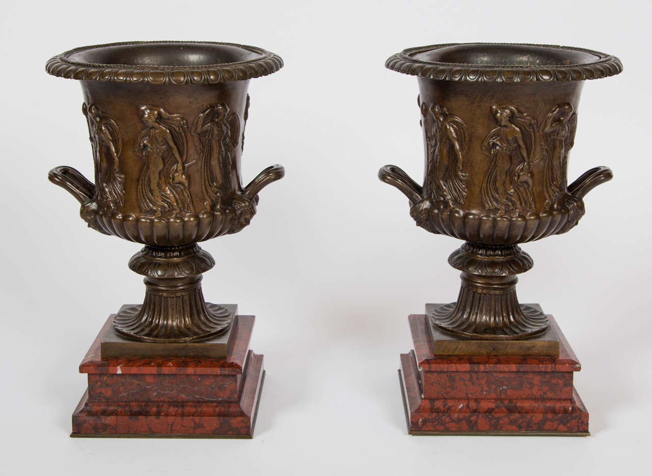 A wonderful pair of late 19th century bronze vases stamped 