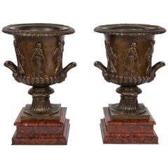Pair of 19th Century Bronze "Borghese" Vases on Red Marble Plinths