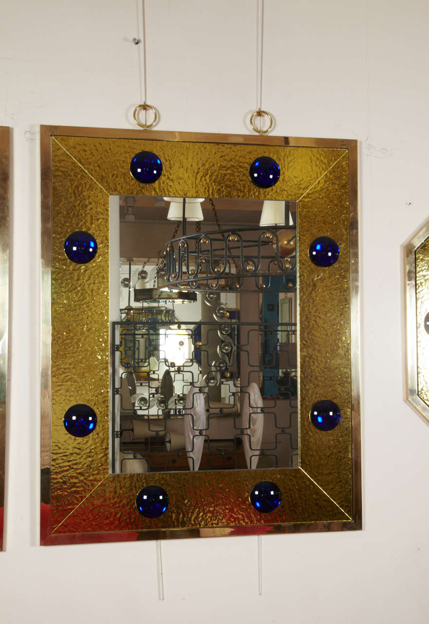 Spectacular rectangular mirror with gold leaf effect frame by Andre Hayat.