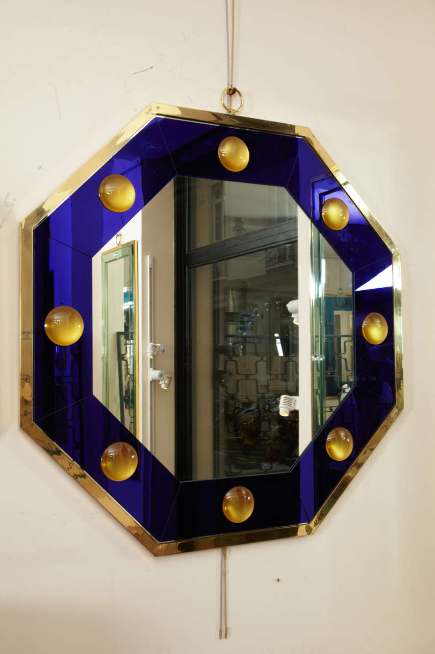 Spectacular octagonal mirror with deep blue effect frame by Andre Hayat.