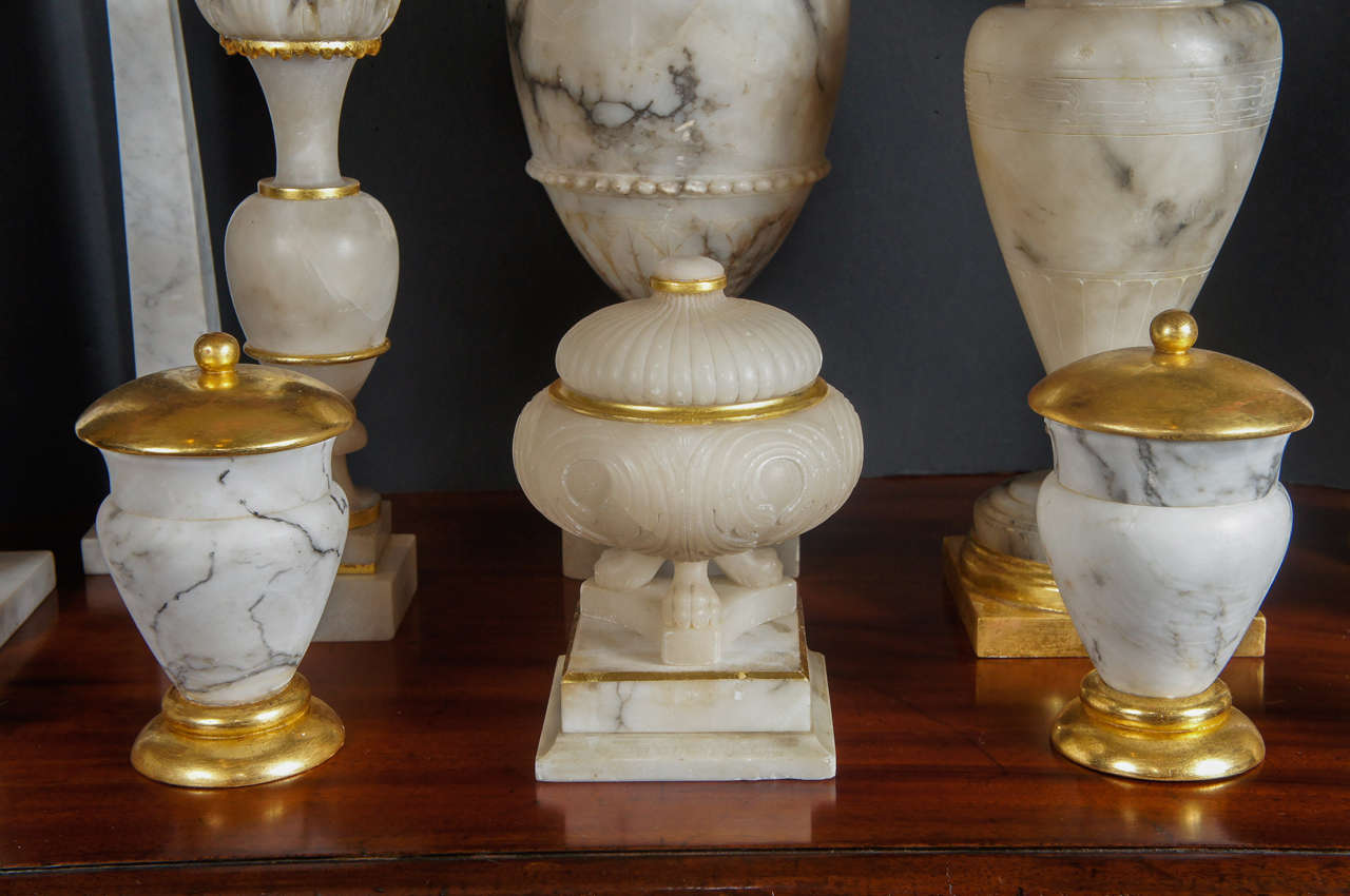 Italian Large Collection of Carved Marble and Water Gilded Decorative Objects