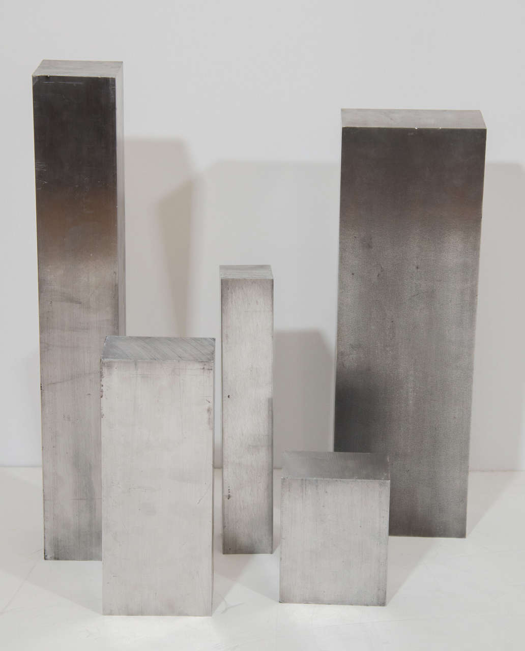 A vintage free standing steel cityscape or skyline sculpture, designed in the style of Richard Serra consisting of five free-standing buildings.Possibly used as a prototype model of a large scale sculpture.

Good vintage condition with age