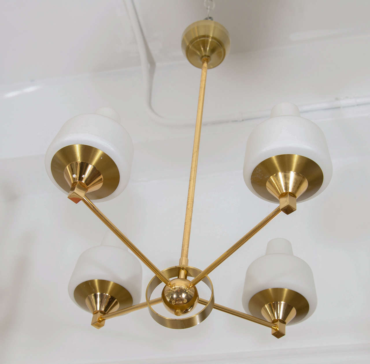 A midcentury brass framed, four-arm French pendant or chandelier with frosted glass shades.

Good vintage condition with age appropriate wear.

Reduced from: 2800.