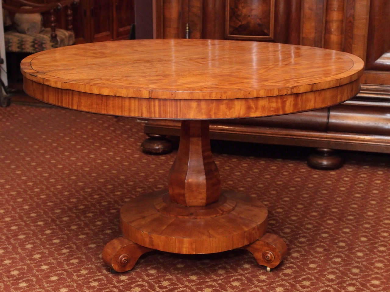 French Louis Philippe period satinwood tilt-top gueridon on chamfered base, with incised border