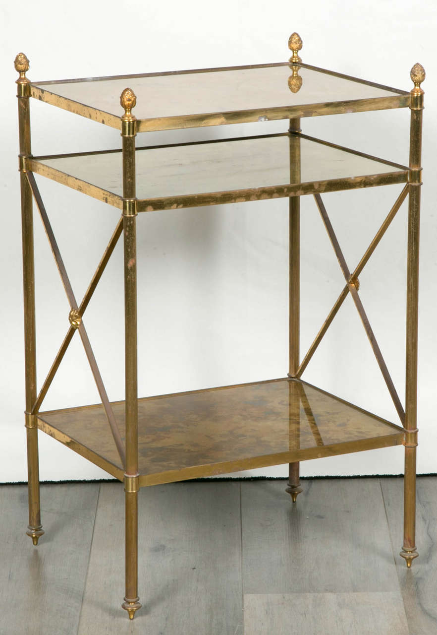 Very elegant and perfect pair of side tables in brass.
Each table features three originals, perfects and gilt glasses.
Unusual model.
France, Maison Baguès.