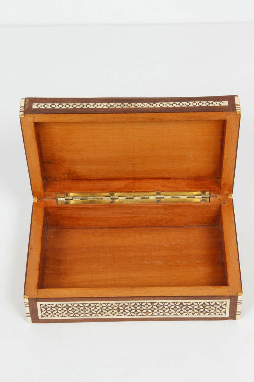 wooden box with mother of pearl inlay