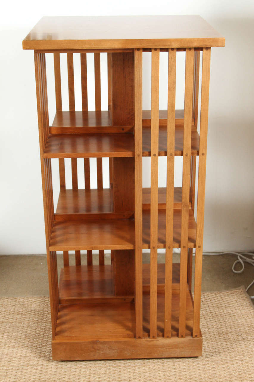 This honey colored Stickley revolving bookcase is set apart from the more typical darker version. Beautifully crafted and highly functional. Great for libraries and the odd corner that needs filling.