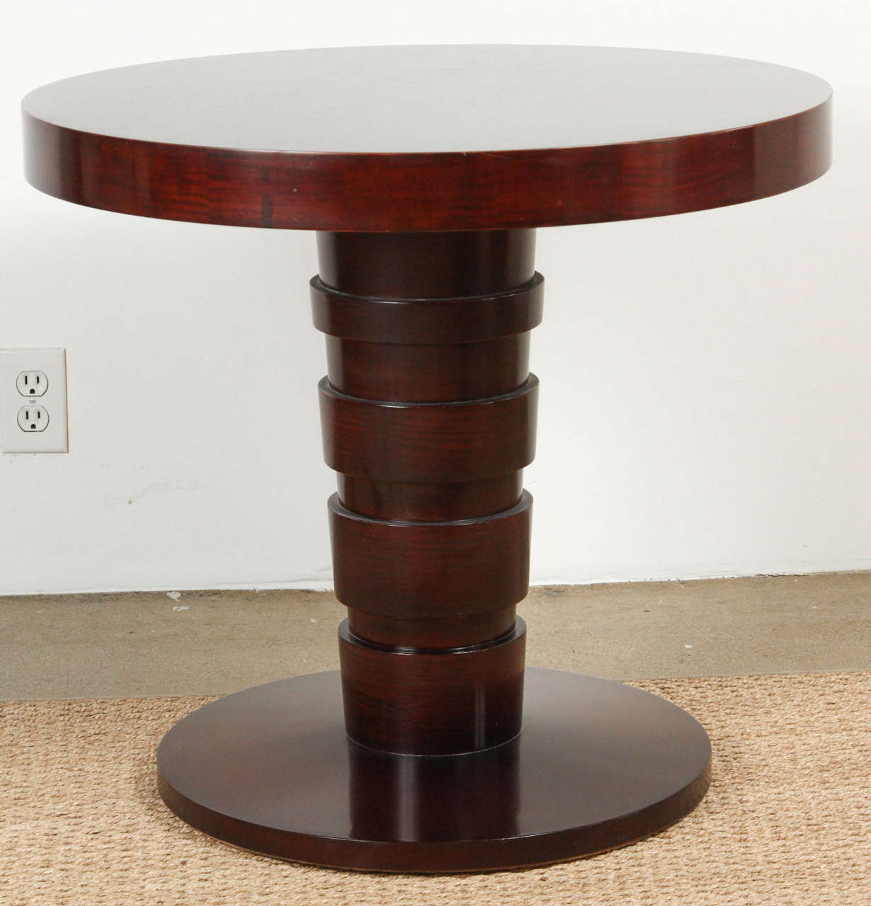 Unusual and stunning Widdicomb side table. Cone shaped base with circular top.