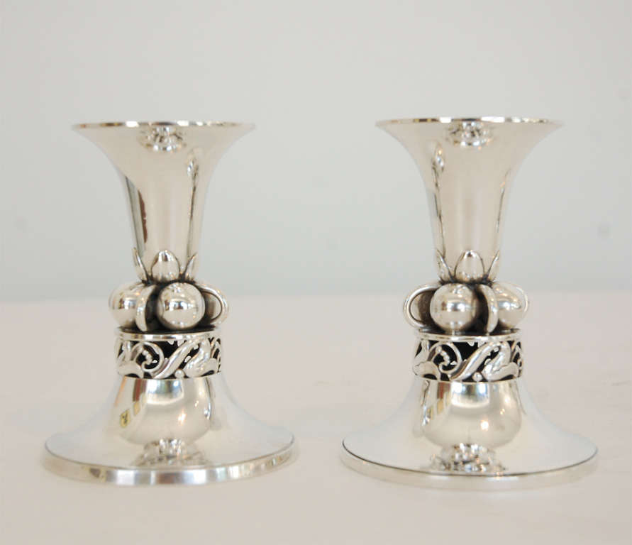 A pair of sterling silver candlesticks (shorter pair is SOLD). Stamped 