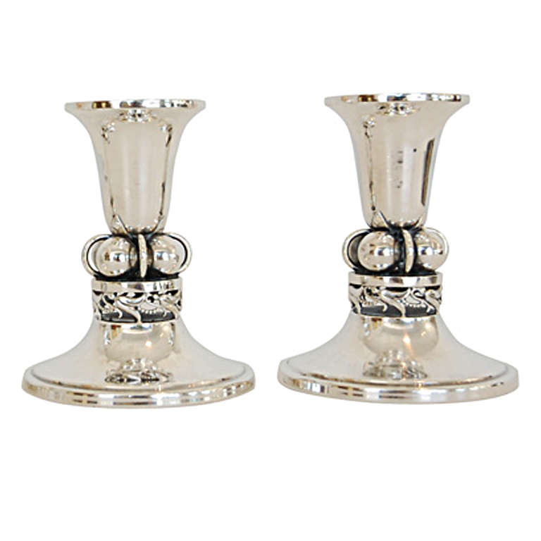 A Pair of Sterling Candlesticks by Alphonse La Paglia
