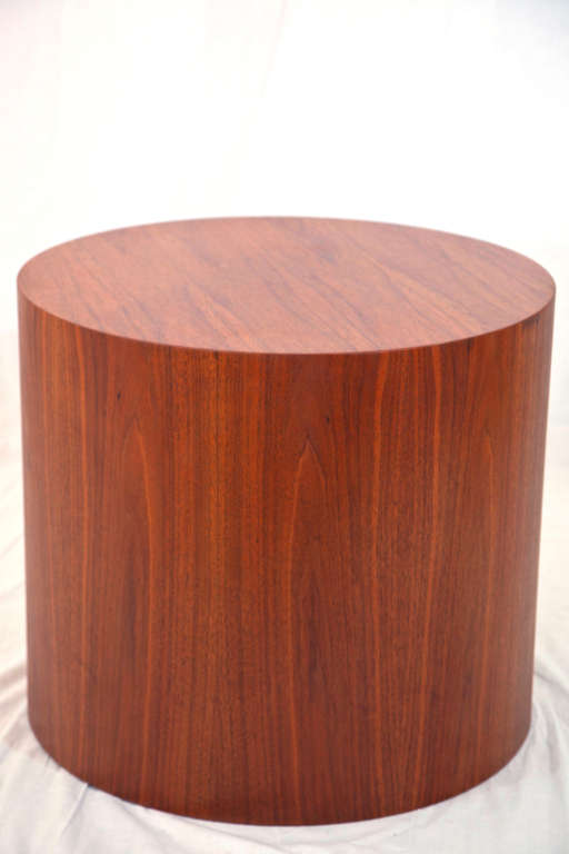 Sleek occasional table in lovely teak. Very nice lines. Perfect in any decor.