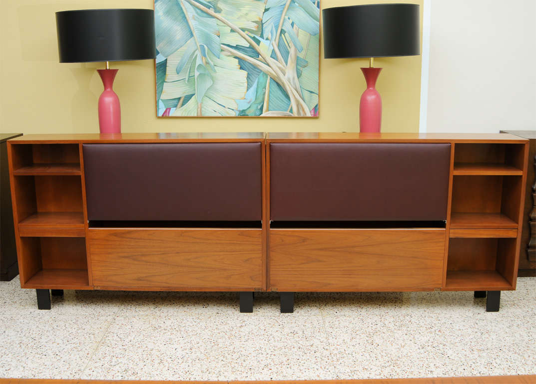 SOLD  SOLD Smart & classic George Nelson design for the Herman Miller Collection of the early 50's, this pair of walnut King headboard storage units with bedside shelves and table are quite beautiful and utile.  Consisting of a mirror image left and