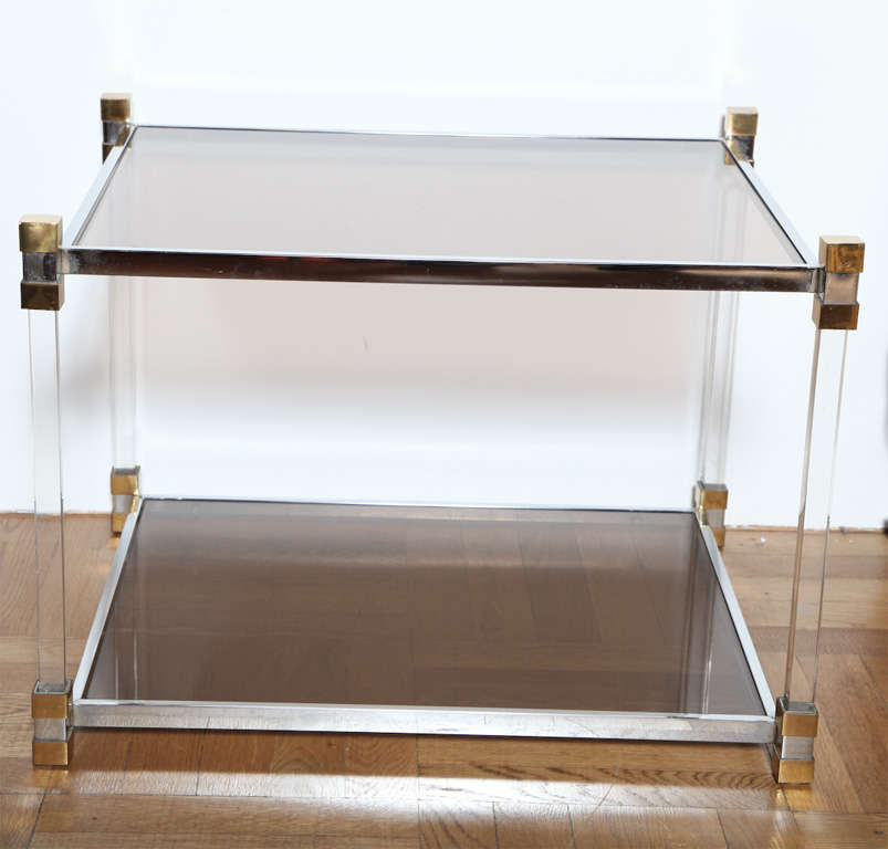 A Pair of Chrome, Smoked Glass and Lucite End Tables