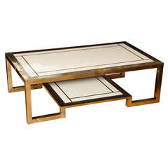A Brass, Lacquer and Chrome Trimmed Low Table