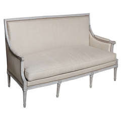 A Louis XVI Style Carved and Painted Canape