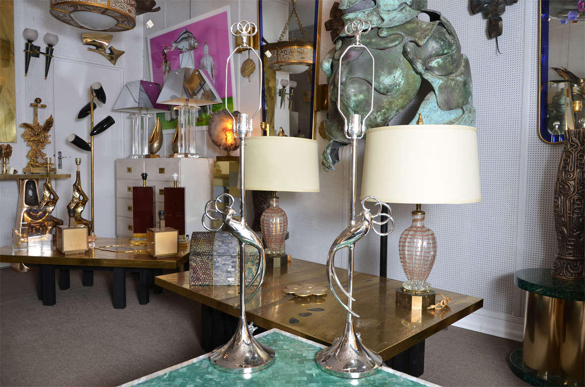 1940s silvered metal pair of table lamps showing Island bird.