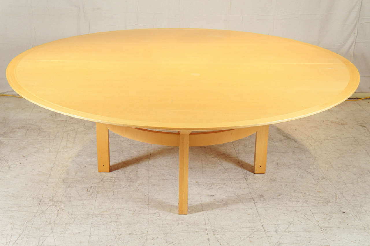 Mid century modern dining table by Danish furniture designers Rudd Thygesen and Johnny Sorensen in Maple.  Seats 10 easily.