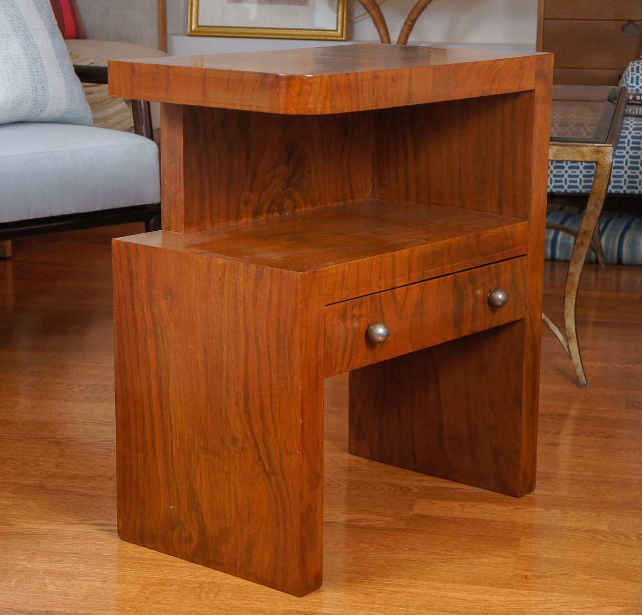 Unique and functional, side table with single drawer and open shelf.