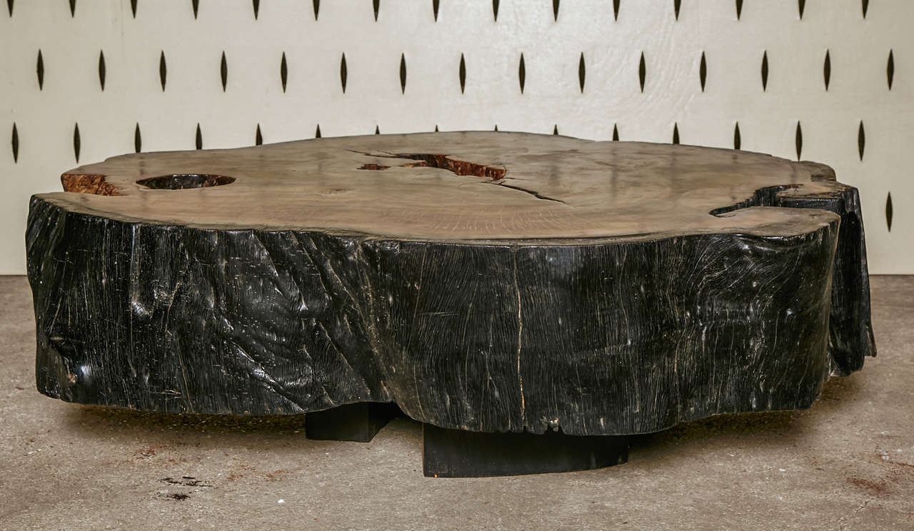 Round azobewood coffee table with very nice patina on top.