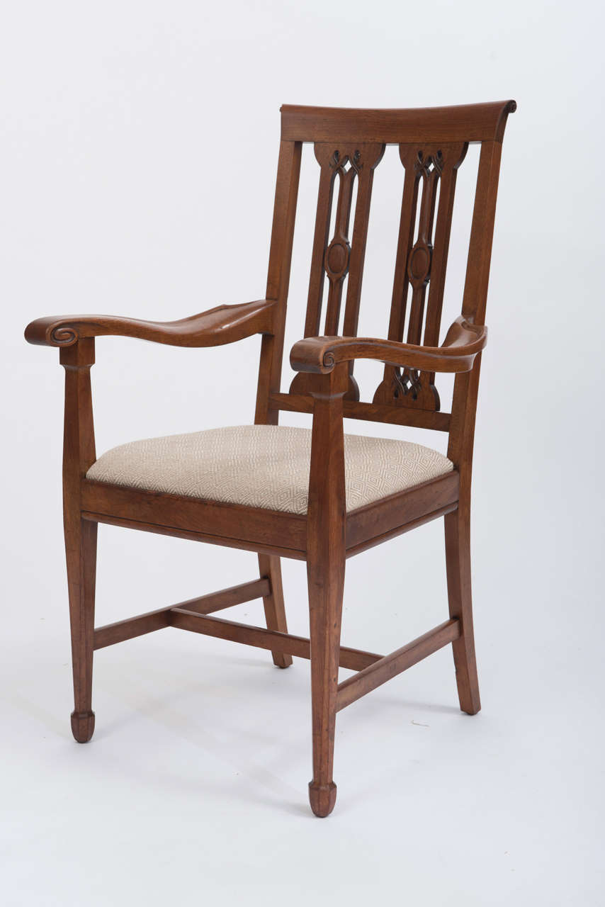 A set of 8 Walnut Dining Chairs by Arthur Simpson of Kendal (1857-1922. Including two carvers. Each with Paper scroll top rails with twin pierced and moulded splats above drop in seats, on square tapered and chamfered legs.
English
Circa